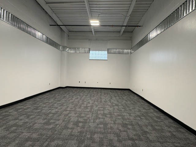 Office 4 — 313 SF with glass-block window